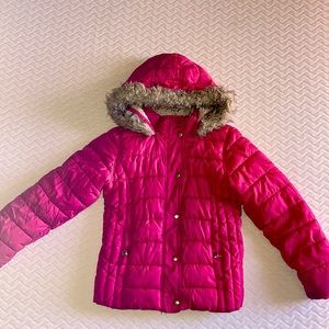 A pink jacket great for the cold fur inside for kids
